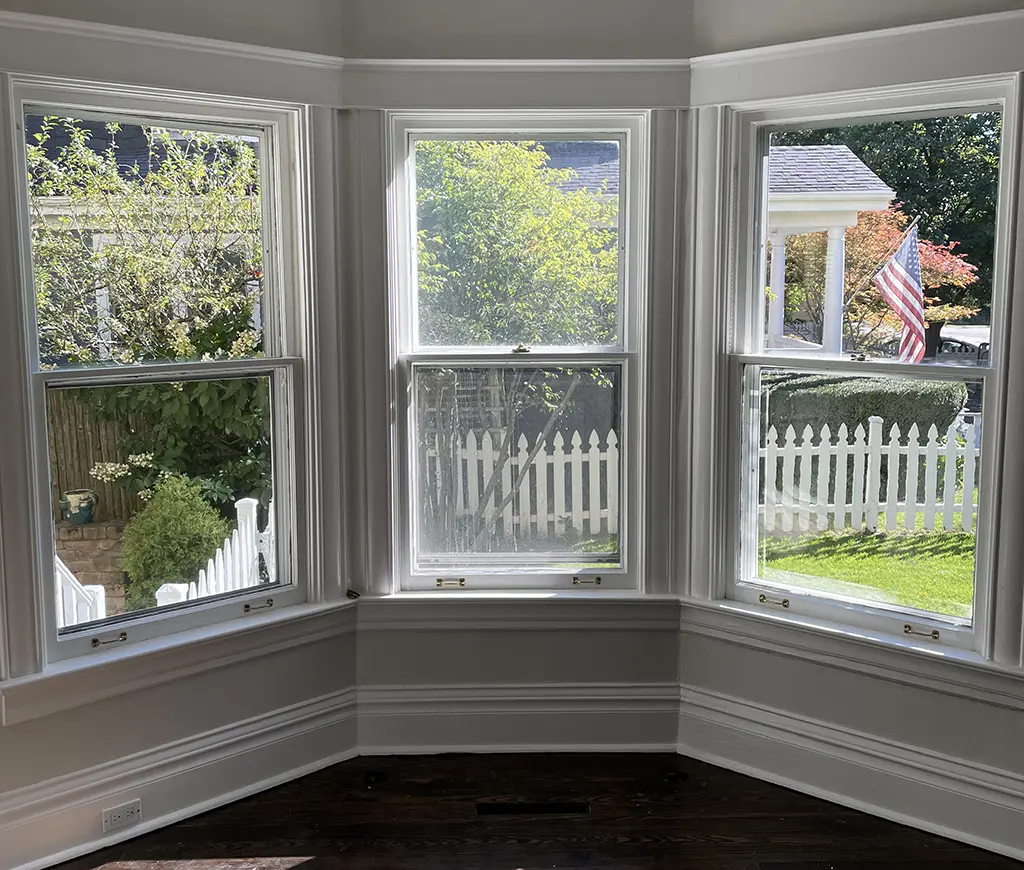 three residential windows two clean and one dirty