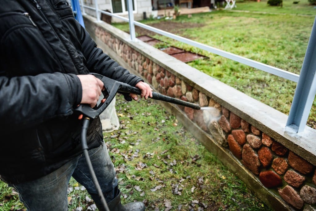 power washing stone wall
