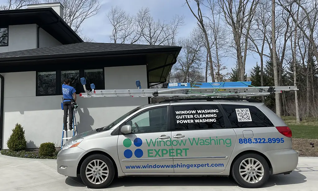 Silver car near house