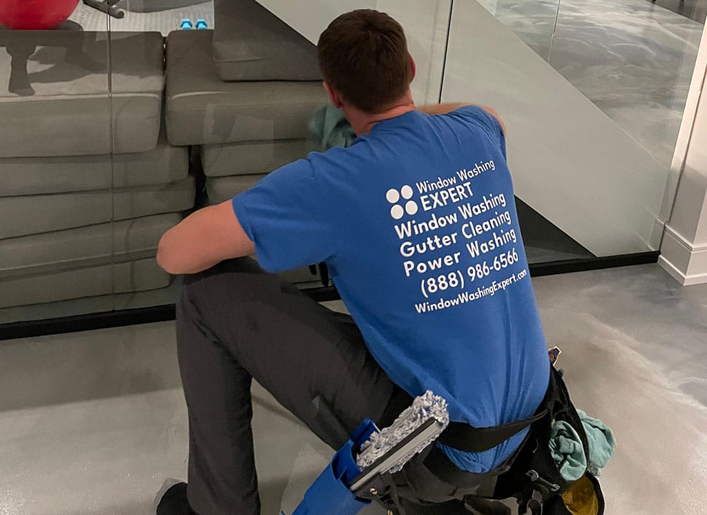 window washer cleaning glass 